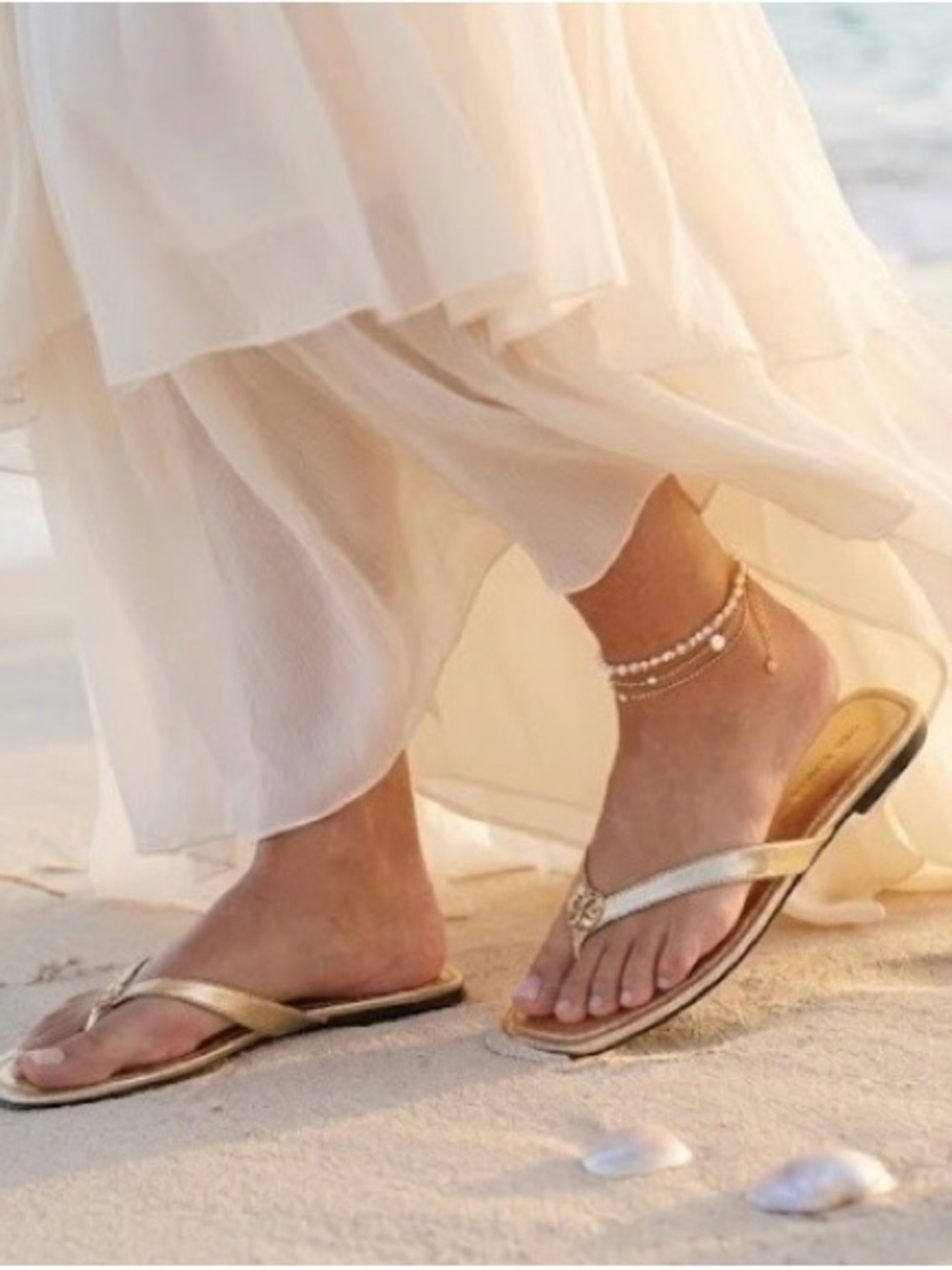 TORY BURCH Metallic Gold Leather Thong Sandals with Logo Medallion